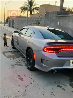 دۆج چارجەر